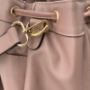 The DARA tennis & pickleball bag is made from a Saffiano vegan leather with an easily accessible interior pocket, convertible bag can be worn over the